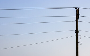 High voltage electricity transmission pole in the urban area