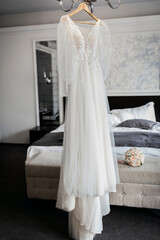 Wedding dress in a spacious room close up
