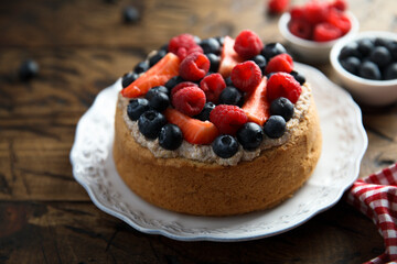 Homemade berry cake with cream filling