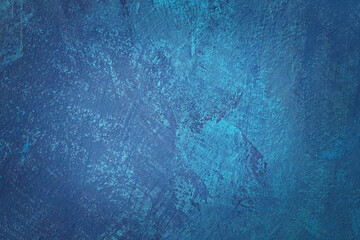Blue colored abstract textured background. Decorative plaster on the wall