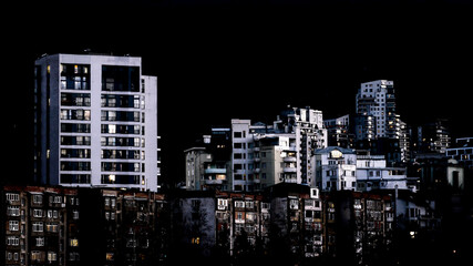 Evening towncape with various residential buildings. Residential building's view after sunset.