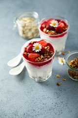 Yogurt dessert with granola and berries