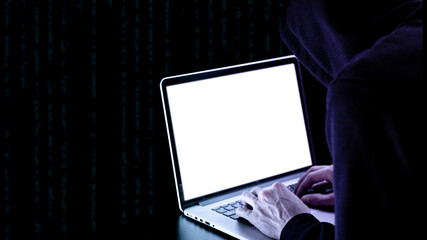 Cyber security hacker concept. Internet web hack technology. Digital laptop in hacker man hand isolated on black banner. Data protection, secured internet access, cybersecurity.