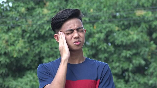 Asian Male Teen Stress And Confusion