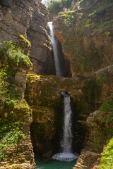 beautiful waterfall with crystal clear water in the Albania