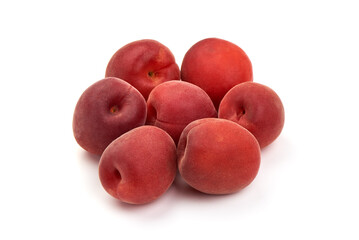 Sweet juicy red apricots, ripe nectarines, isolated on white background.
