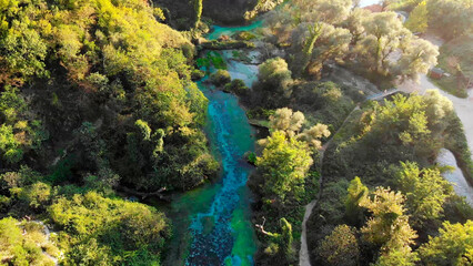 Naklejka na ściany i meble Blue Eye water spring with clear blue water summer view near Muzine in Vlore County, Albania