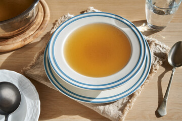Beef bone broth in a soup bowl