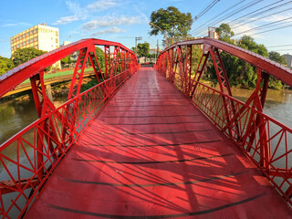 red bridge over the river on the downtown