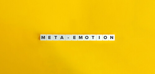 Meta-emotion Banner. Letter Tiles on Yellow Background. Minimal Aesthetics.