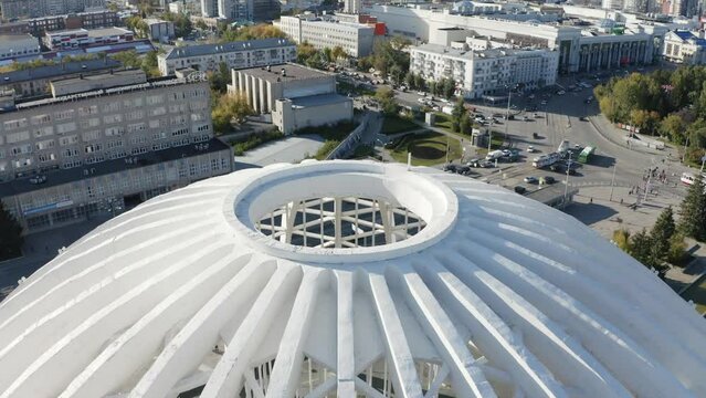 Aerial view of large and beautiful dome of the circus, Ekaterinburg, Russia. Stock footage. Residential buildings and beautiful office buildings on a summer day.