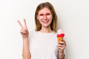 Young English woman holding an ice cream isolated on white background showing number two with fingers.