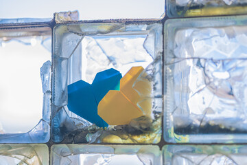 Hearts With Ukrainian Flag Colors In Brocken Window - Ukraine War Concept