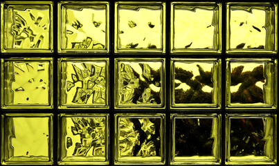 Golden glass block wall as a background for abstract works.