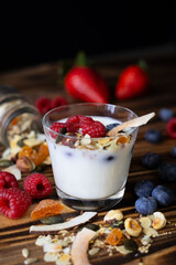 Yogurt with müsli and fruit 