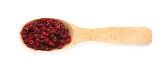 Dried red currants in wooden spoon on white background, top view