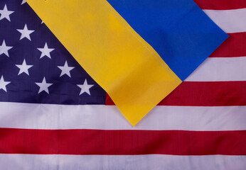 Flags of the USA, Russia, Ukraine with gun on the background . Peace concept