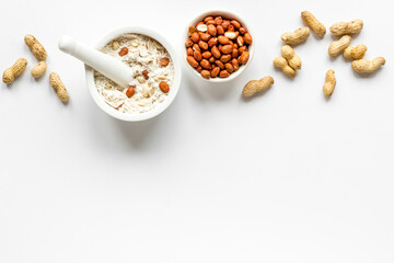 Peanut flour in bowl - gluten free nuts flour for baking