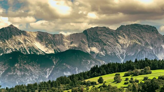 Timelapse of a storm approaching the peaks and mountain ranges of the Alps on the border between Italy and Austria. Brenner Pass, Italy, Europe