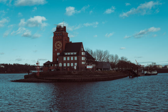 Island with an old house in one of Hamburg's canals
