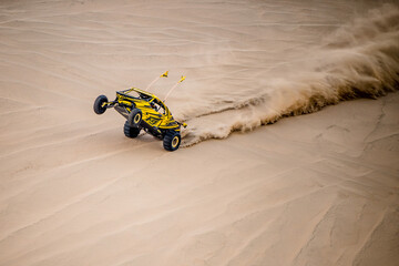 Doha,Qatar,February 23, 2018: Off road buggy car in the sand dunes of the Qatari desert. - Powered by Adobe