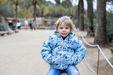 Fototapeta premium Child, posing in park Guell in Barcelona