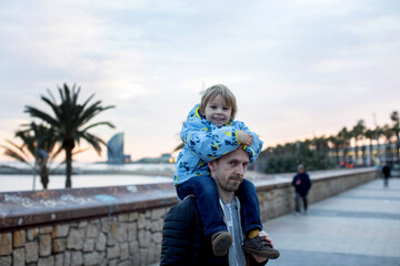 Fototapeta na wymiar Cute little children tourists admiring Barcelona city, family travel with kids