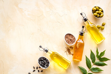 Different kind of cooking oil - sunflower olive and sesame oil with seeds