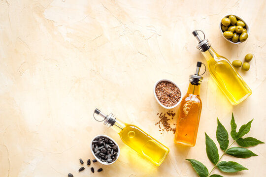 Different Kind Of Cooking Oil - Sunflower Olive And Sesame Oil With Seeds