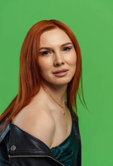 portrait of a girl in a green dress with red hair