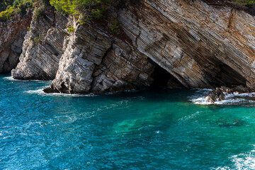 Sea and rocky clifs in town Petrovac, Montenegro