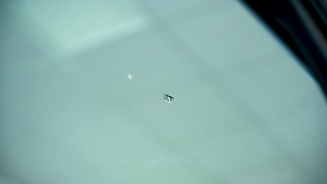 car stone chip being cleaned before repair