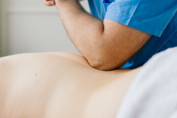 Anti-cellulite foot massage for a fat woman. Concept of personal care, weight loss, diet. Close-up.