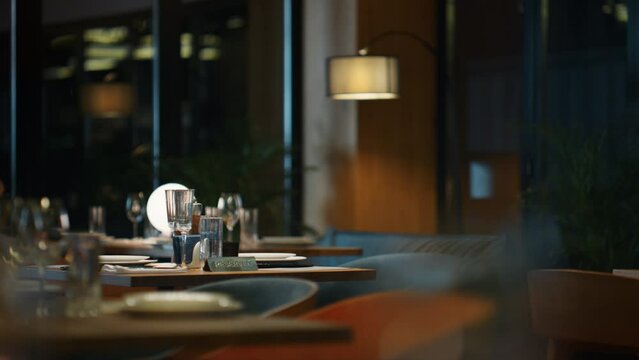 Lonely woman sitting restaurant. Girlfriend waiting date in fancy hotel cafe.