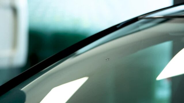 cleaning the impact area of an stone chip in a cars windscreen