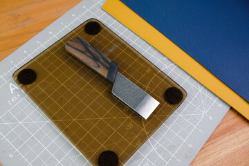 Knife from steel and Ebony wood. Exclusive handmade leather craft tool. 