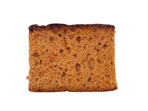 Slice of typical Dutch ontbijtkoek, isolated on a white background.