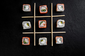 traditional japanese sushi dish, rolls. Sushi on a dark background