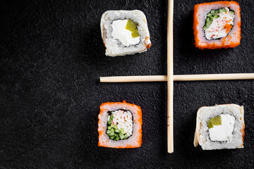 traditional japanese sushi dish, rolls. Sushi on a dark background