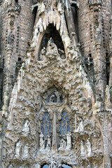 Details of the Nativity scene on the facade of the Sagrada Familia catholic basilica, Barcelona, Catalonia, Spain.