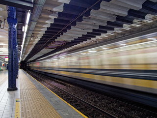 Train entering subway station - 489908953