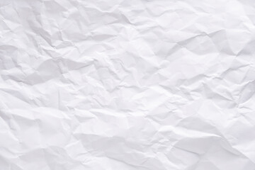 Obraz premium White crumpled paper texture background.
