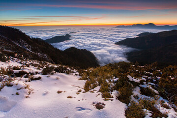 Fototapeta premium Asia - Beautiful landscape of highest mountains reflect fantasy dramatic sunset sky in winter at Taroko National Park, Hehuan Mountain, Taiwan 