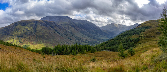 Fototapeta na wymiar Panorama Looking Along Glen Nevis from Cow Hill Summit. Including Meall an t Suidhe, Ben Nevis, Sgurr a Mhaim.