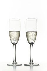 Two glasses of champagne. Isolated on white