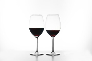 Glass of red wine isolated on white