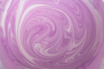 Fototapeta na wymiar Streaks of purple and white paint when mixing different colors to get a shade. Background