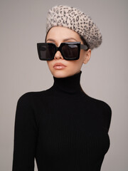 Beautiful young lady in a black turtleneck - 489913928