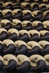 Obraz premium A cookie is a baked or cooked snack or dessert that is typically small, flat, and sweet. 