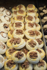 A cookie is a baked or cooked snack or dessert that is typically small, flat, and sweet. 